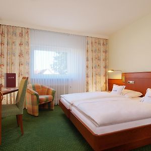 Zimmer mit zwei Einzelbetten